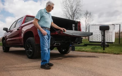 A picture of a lift installed on the back of a pickup truck.