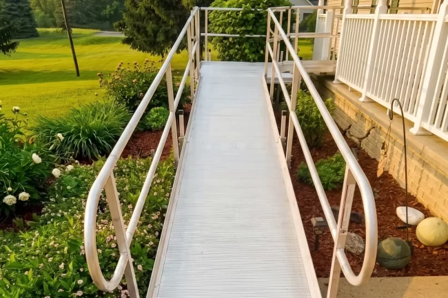A wheelchair ramp installed on the front porch of a home.